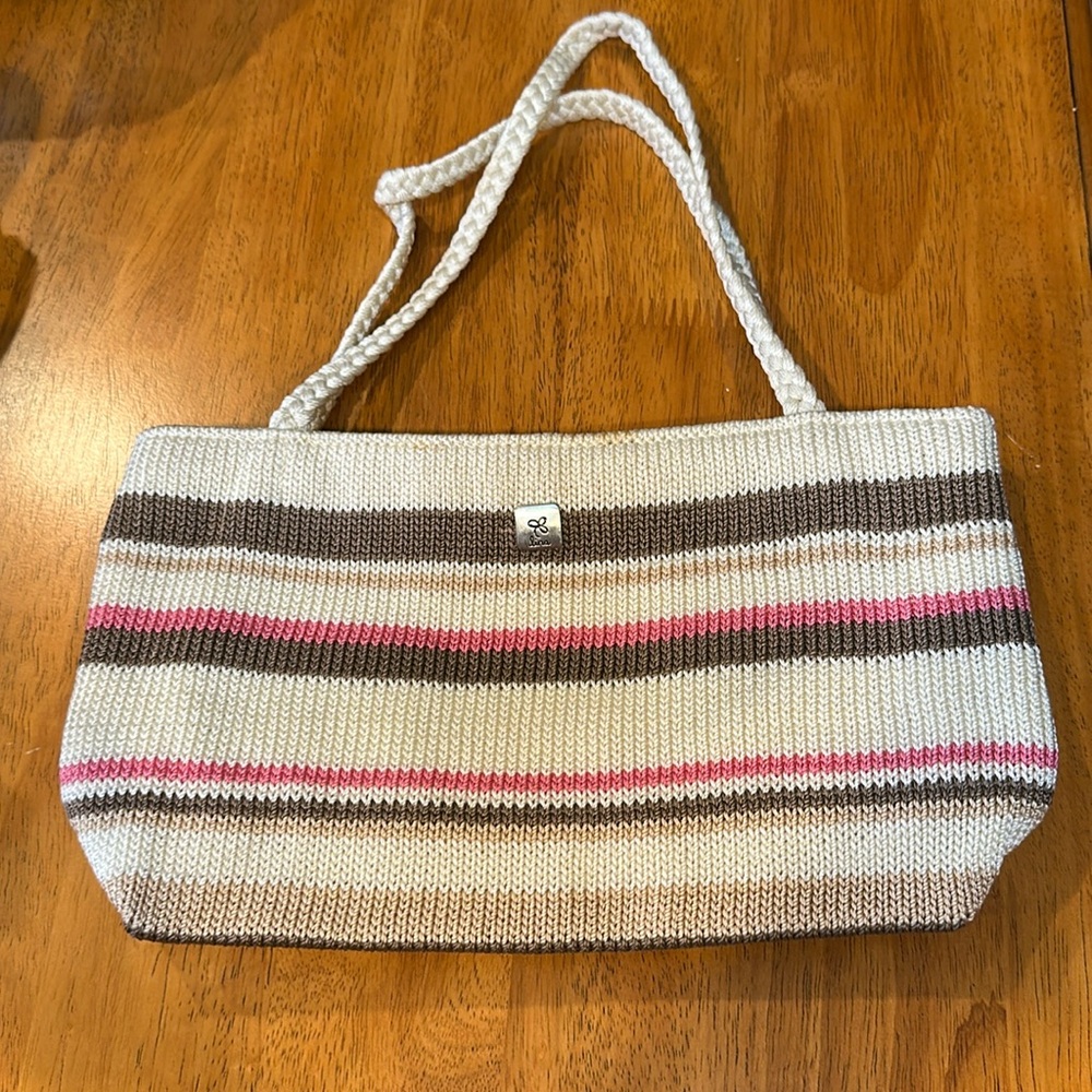 Lina cream brown and pink braided shoulder fashion bag with braided handles.